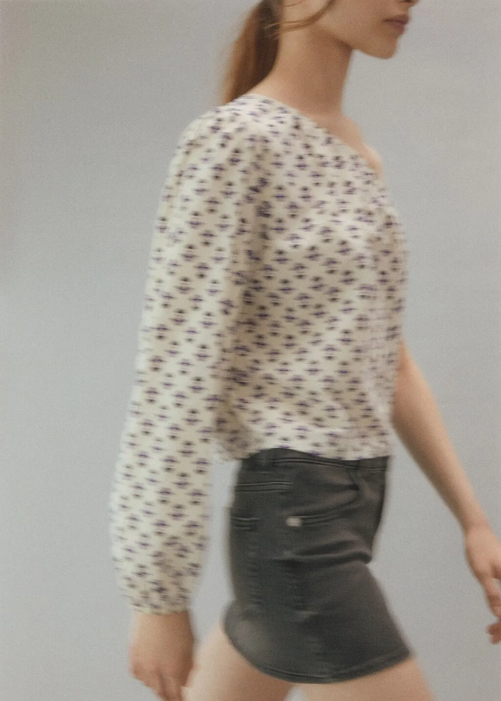 Blusa asimmetrica stampata