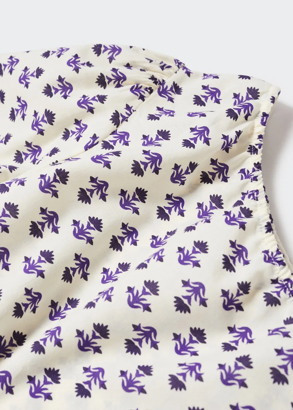 Blusa asimmetrica stampata