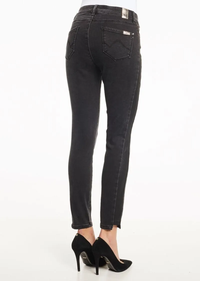 Jeans con inserto in simil pelle