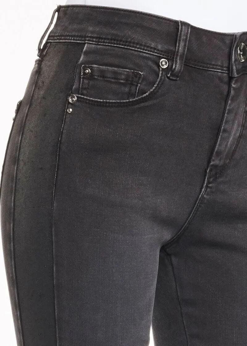 Jeans con inserto in simil pelle