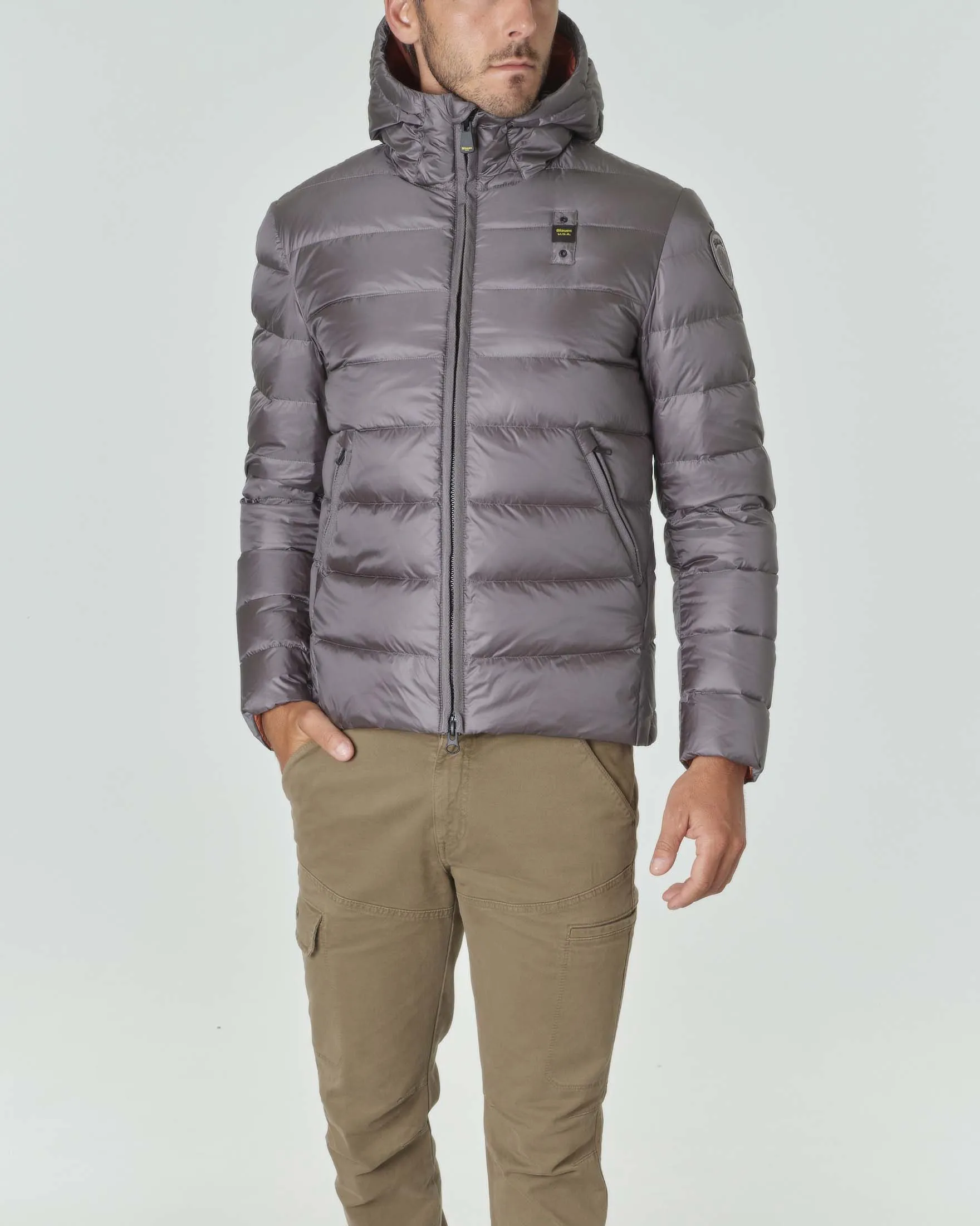 Piumino grigio in nylon opaco con cappuccio fisso e interno arancione