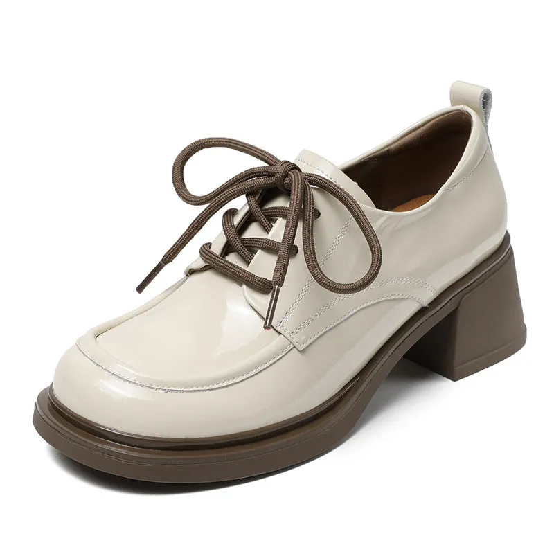 Scarpe da donna con tacco grosso in morbida pelle lucida minimalista