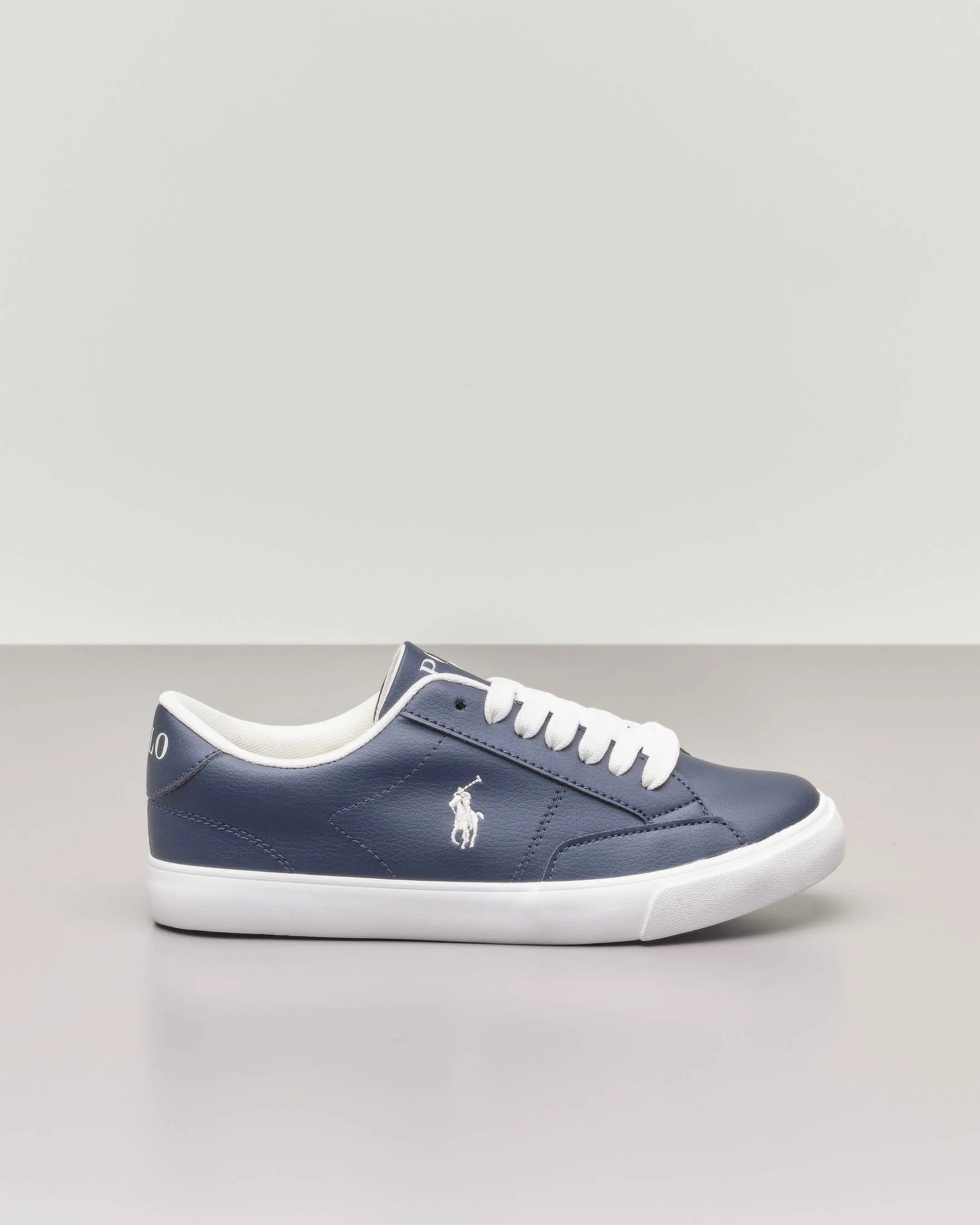 Sneakers blu in ecopelle con pony bianco 35-39